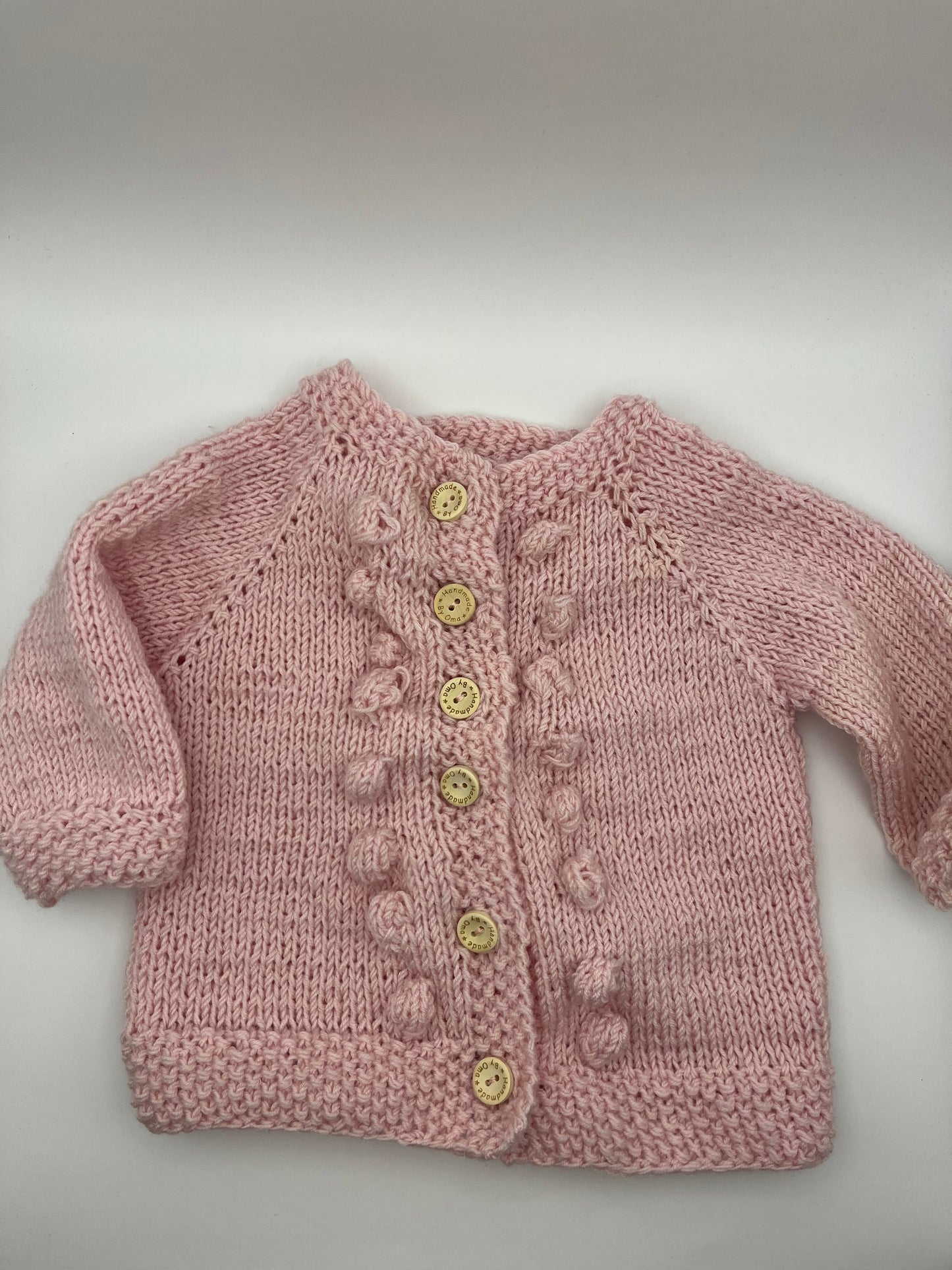 Strickjäckchen aus Merinowolle rosa